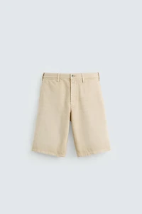 BAGGY FIT BERMUDA SHORTS © OTIS KWAME KYE QUAICOE