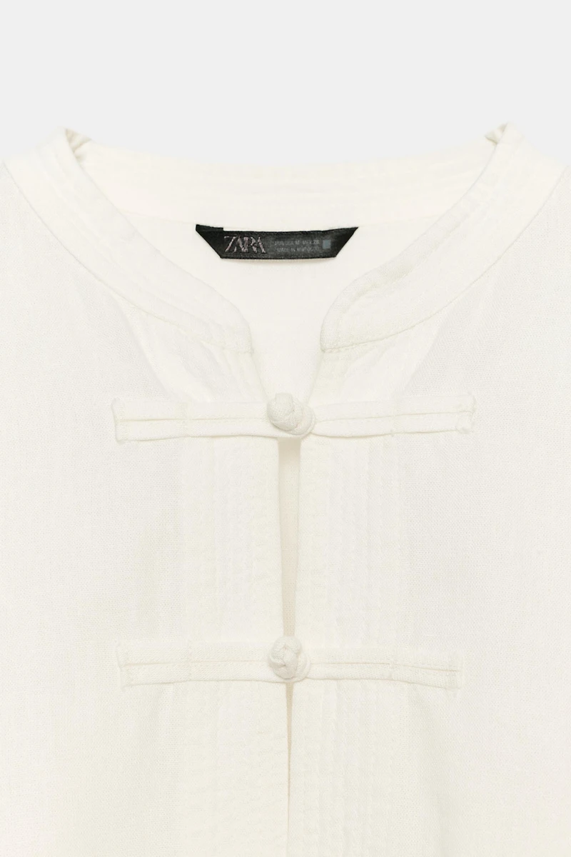 LINEN OVERSIZED SHIRT WITH FROG FASTENING