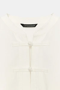LINEN OVERSIZED SHIRT WITH FROG FASTENING