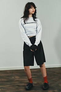 SWEAT À INSCRIPTION EN CONTRASTE