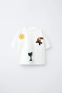 T-SHIRT À PIÈCES EN CROCHET