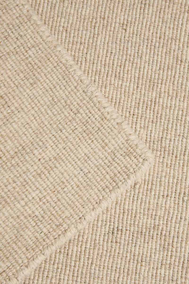 WOOL AREA RUG WITH SCALLOPED LINES