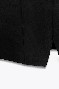 PEPLUM KNIT TOP