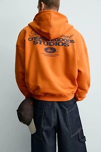 CONTRASTING TEXT ZIP HOODIE