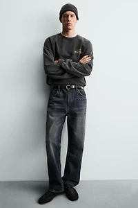 WASHED PRINTED TEXT SWEATSHIRT