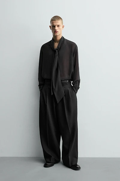 CHEMISE SEMI-TRANSPARENTE À NŒUD