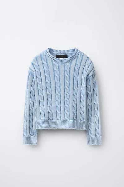 PULL EN MAILLE À TORSADES DÉLAVÉ