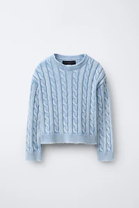 PULL EN MAILLE À TORSADES DÉLAVÉ