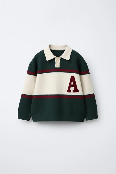 POLO EN MAILLE VARSITY