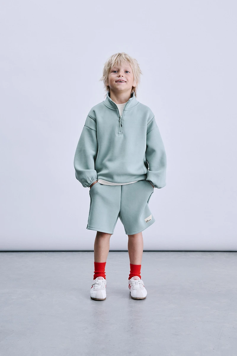 INTERLOCK LABEL SWEATSHIRT