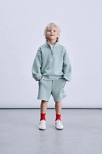 INTERLOCK LABEL SWEATSHIRT