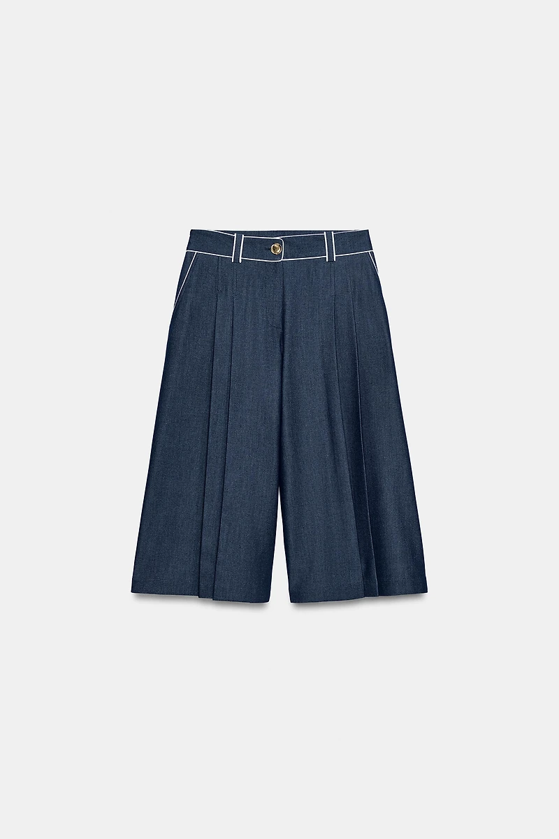 SHORT LARGE À LISERÉS EN CONTRASTE
