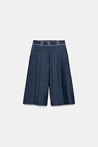 SHORT LARGE À LISERÉS EN CONTRASTE