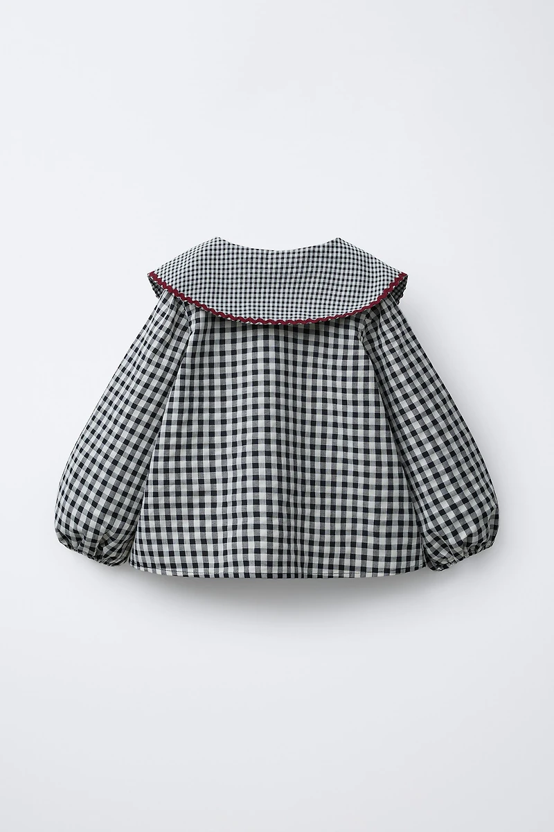 RUFFLE GINGHAM BLOUSE