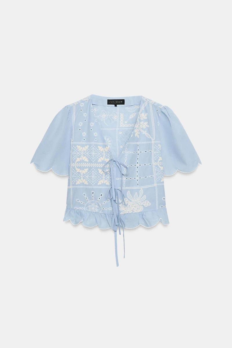 PERFORATED EMBROIDERED TIE BLOUSE