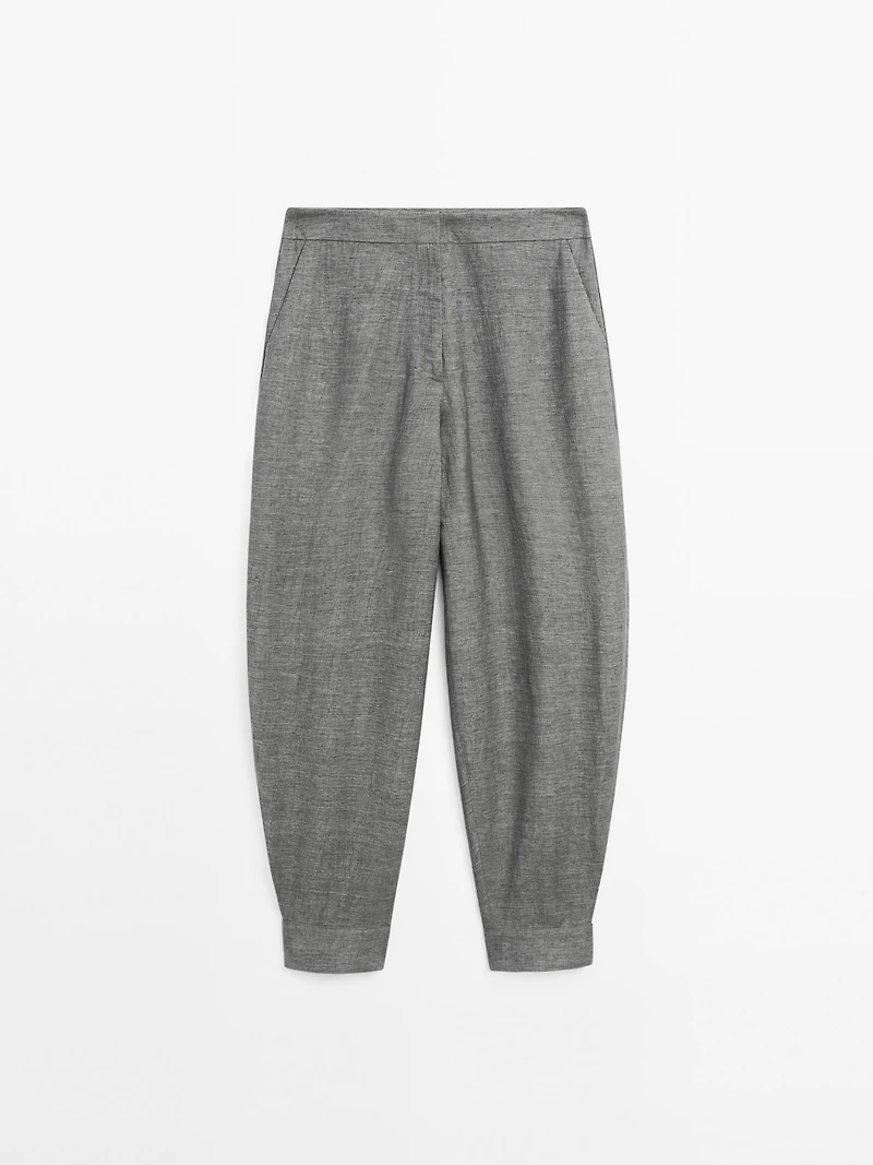 Balloon fit trousers with button details