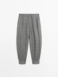 Balloon fit trousers with button details