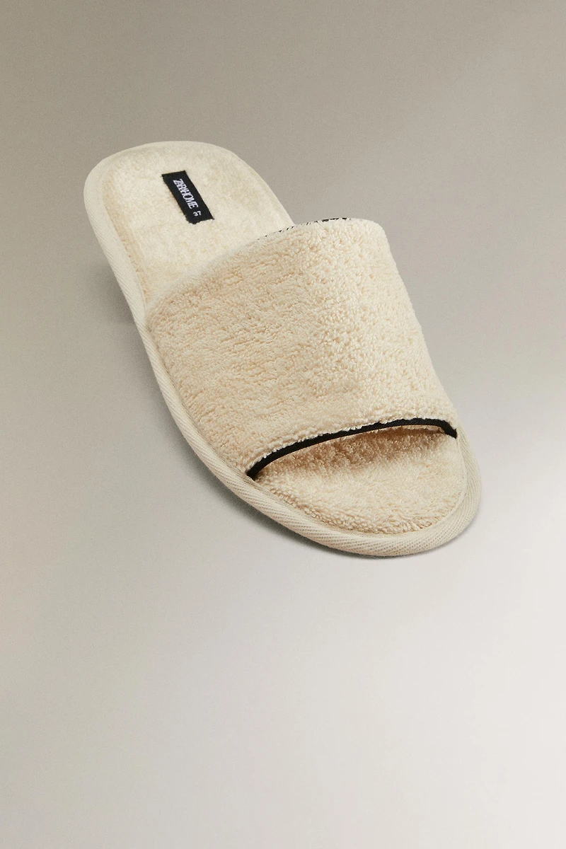 TERRY SLIDERS WITH PIPING
