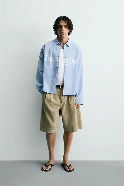 RELAXED FIT PLAID TEXT SHIRT