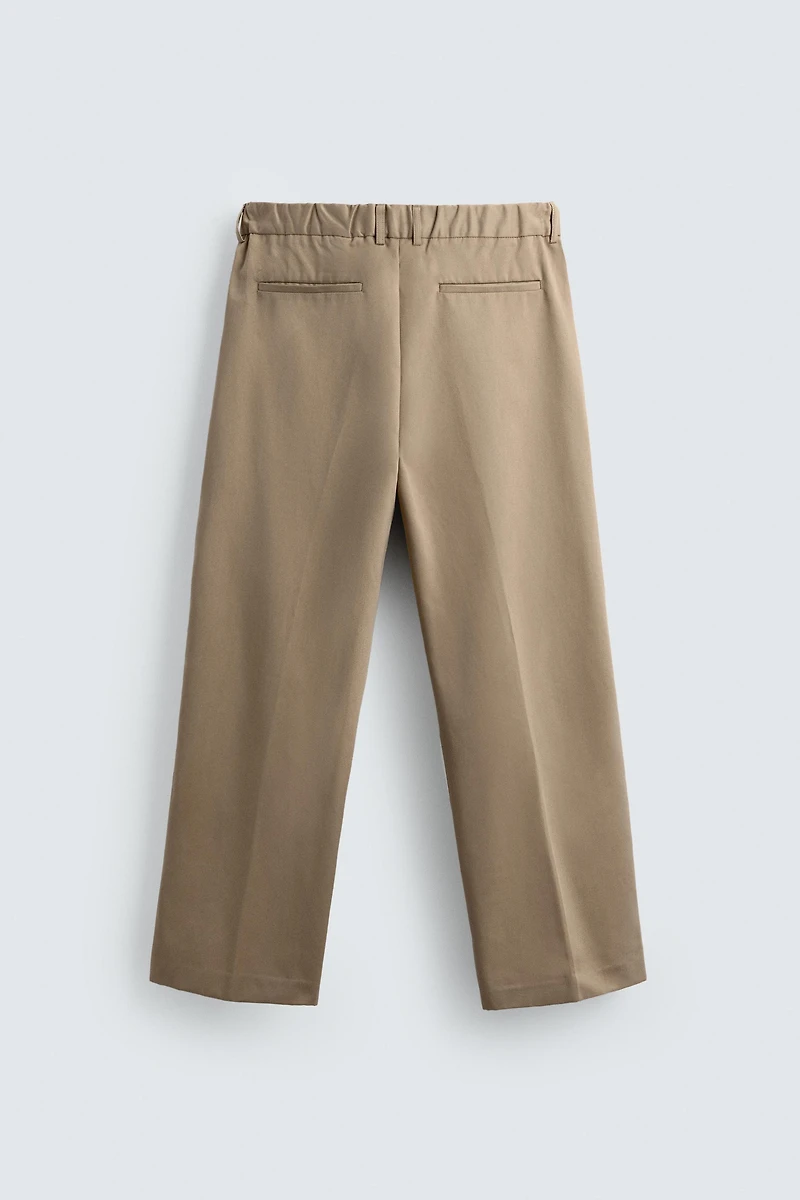 RELAXED FIT PLEATED PANTS