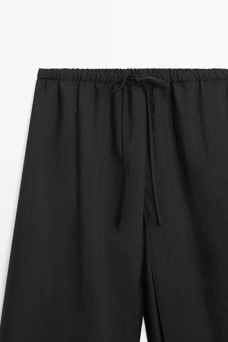 Double-layer pants with tie detail