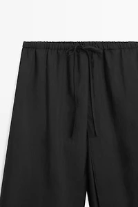 Double-layer pants with tie detail