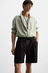 PLEATED FLOWY SHORTS