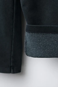 WASHED EFFECT WIDE LEG PANTS WITH STARS AND STUDS