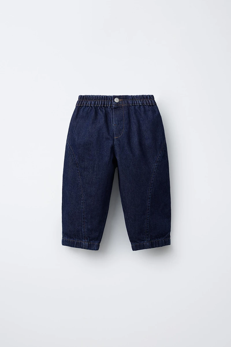 JEAN BAGGY À COUTURES