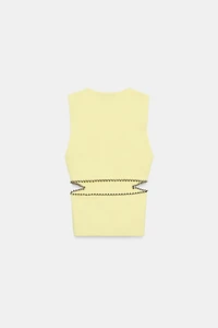 CUT OUT KNIT TOP WITH BEADS