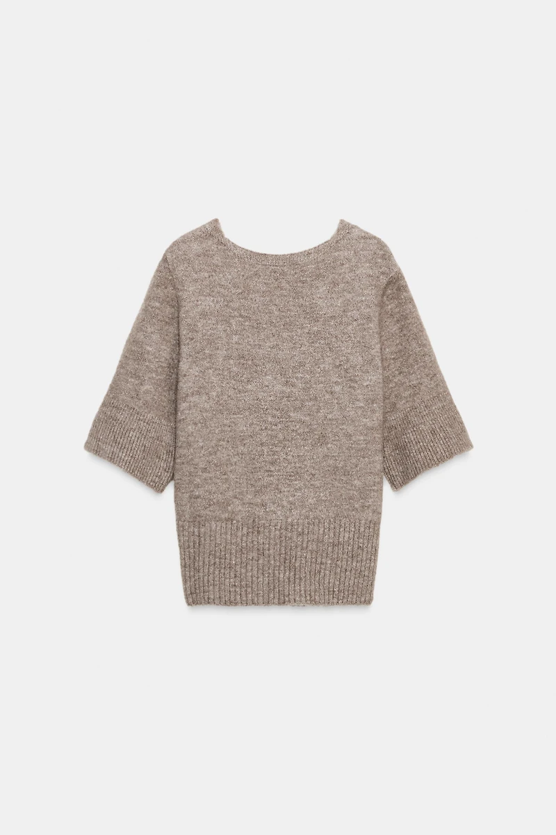 TOP EN MAILLE DOS NU