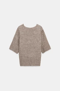 TOP EN MAILLE DOS NU
