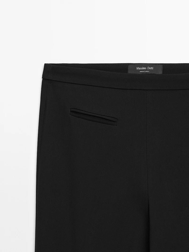 Flared trousers with pocket