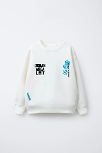 FLOCKED TEXT SWEATSHIRT