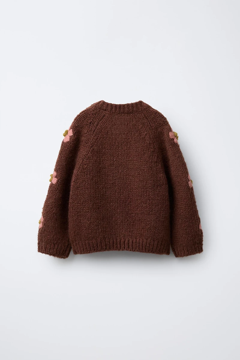 GILET EN MAILLE À FLEURS BRODÉES