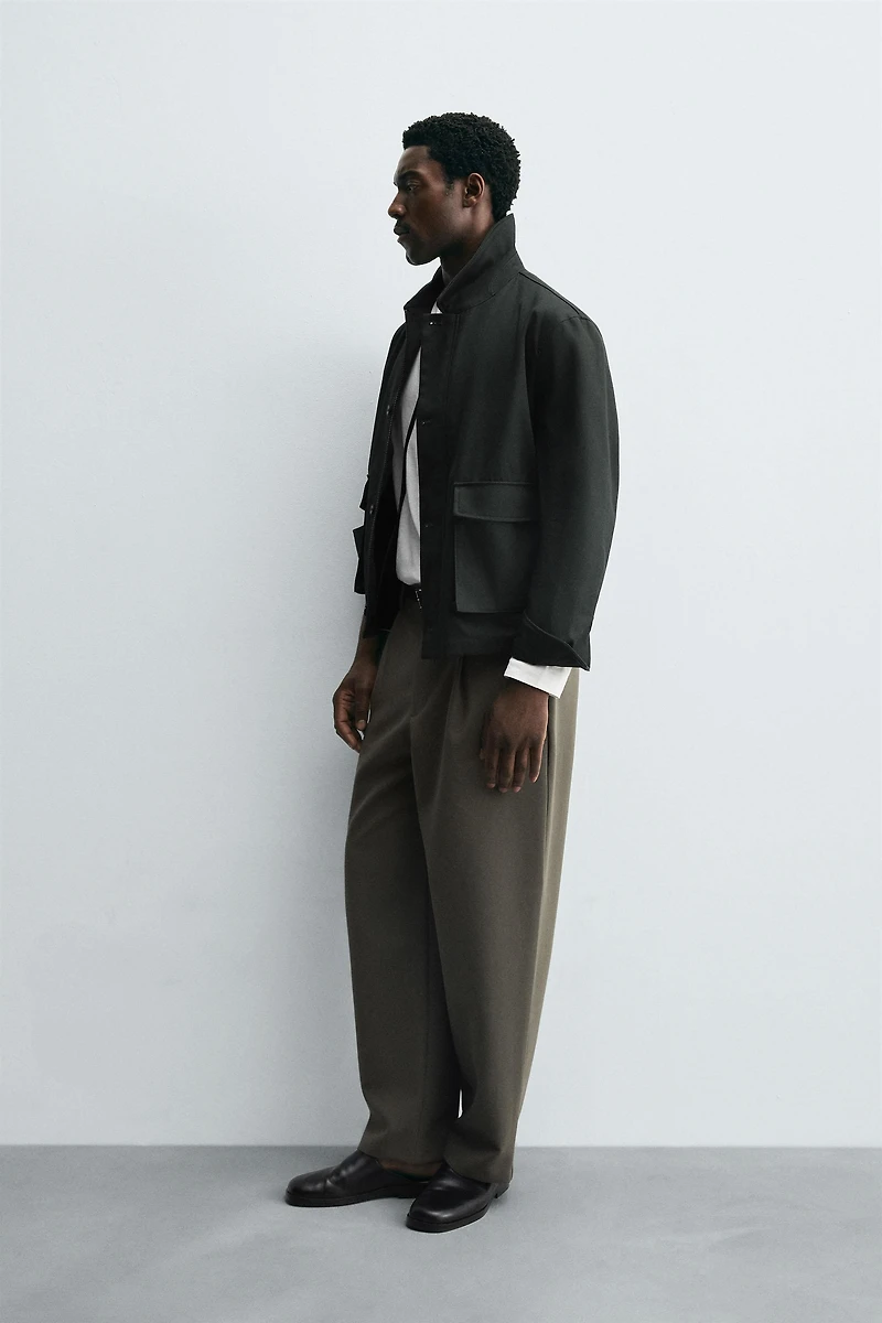 RELAXED FIT PLEATED PANTS