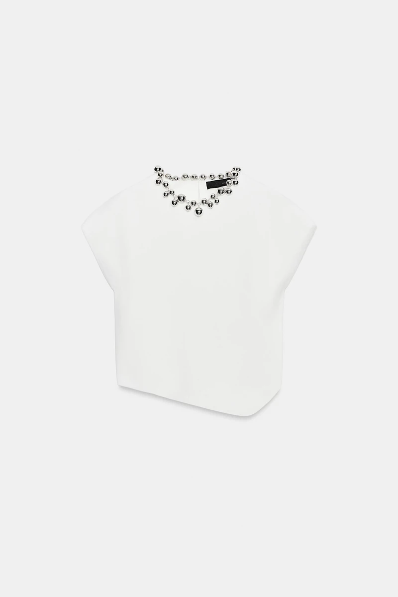 TOP EN MAILLE À BOULES AU COL
