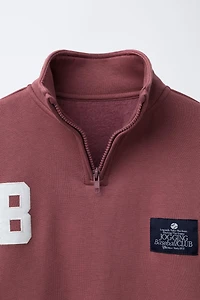 SWEAT DE JOGGING BRODÉ ET ÉTIQUETTE