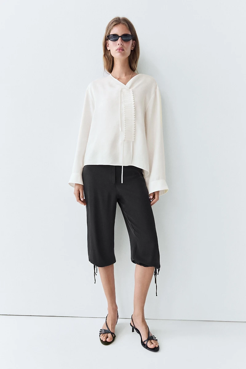 Flowing linen blend blouse with button detail