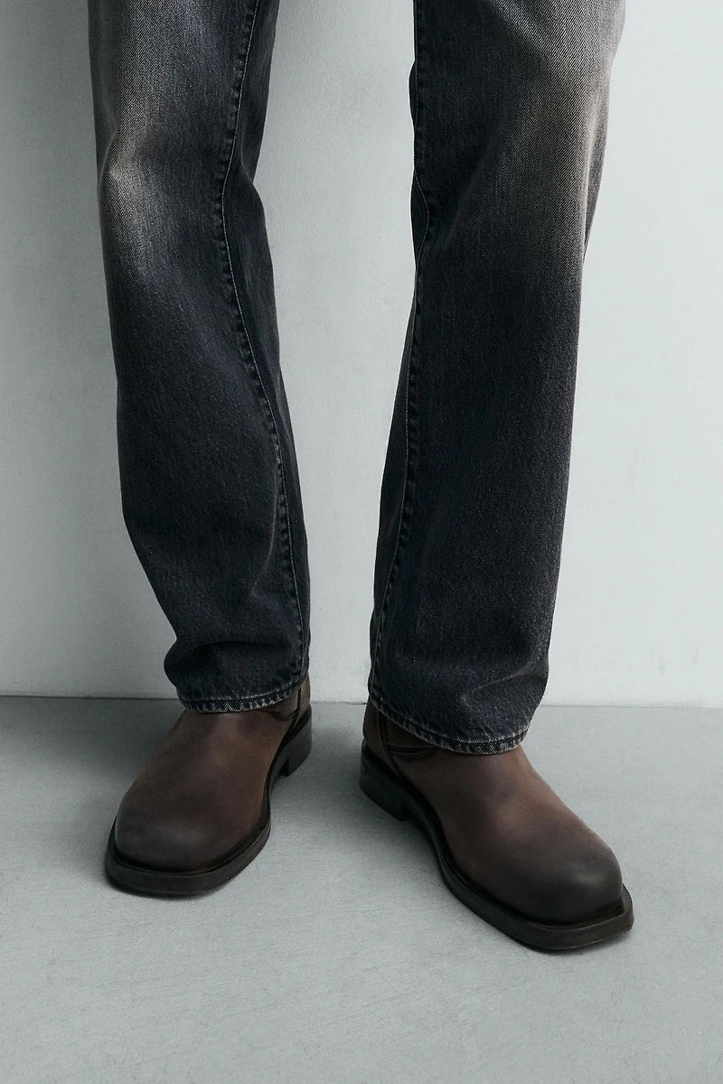 LIMITED EDITION BUCKLED LEATHER BOOTS