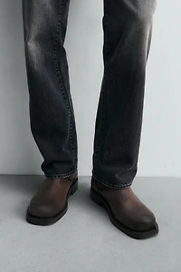 LIMITED EDITION BUCKLED LEATHER BOOTS