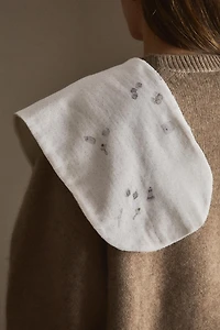 BAVOIR BÉBÉ ÉPAULE