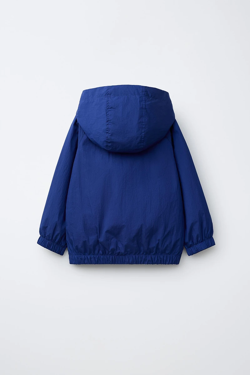 LIGHTWEIGHT WATER REPELLENT RAINCOAT