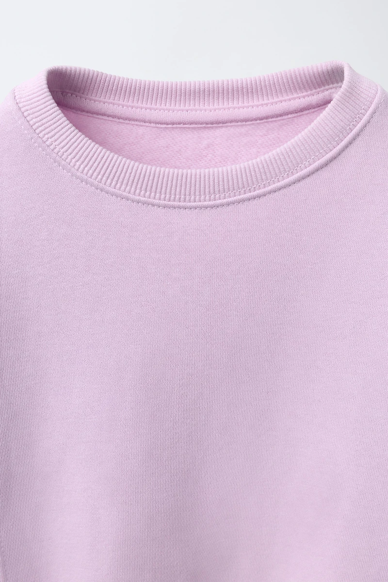 ENSEMBLE DE JOGGING AVEC SWEAT À NŒUD ET LEGGING CÔTELÉ