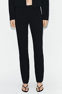 PANTALON FLARE À PASSANTS