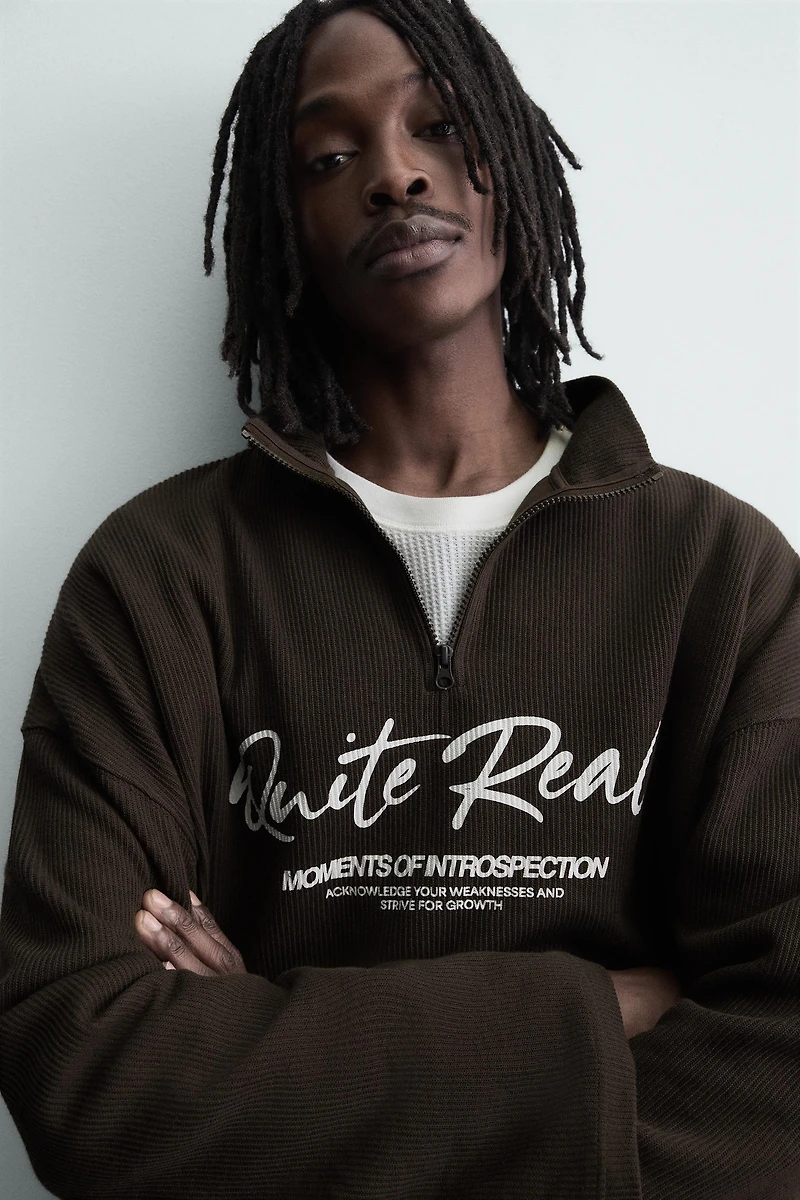 PRINTED QUARTER-ZIP SWEATSHIRT