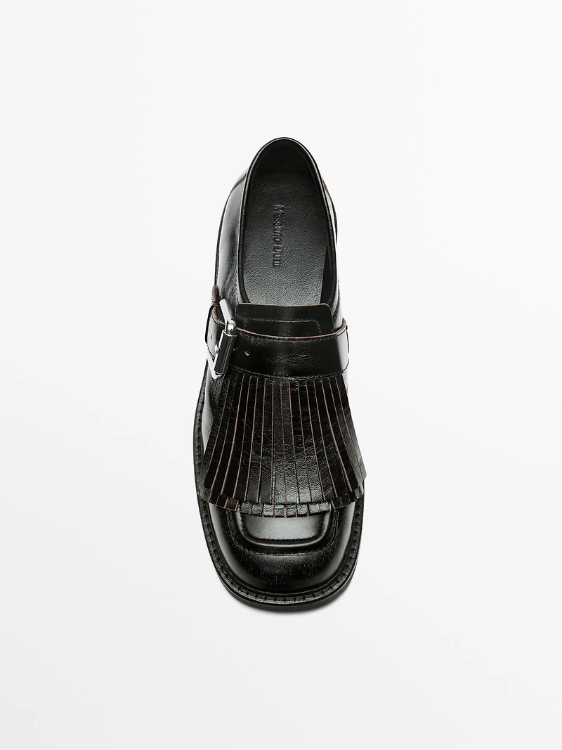 Buckled derby shoes with fringe