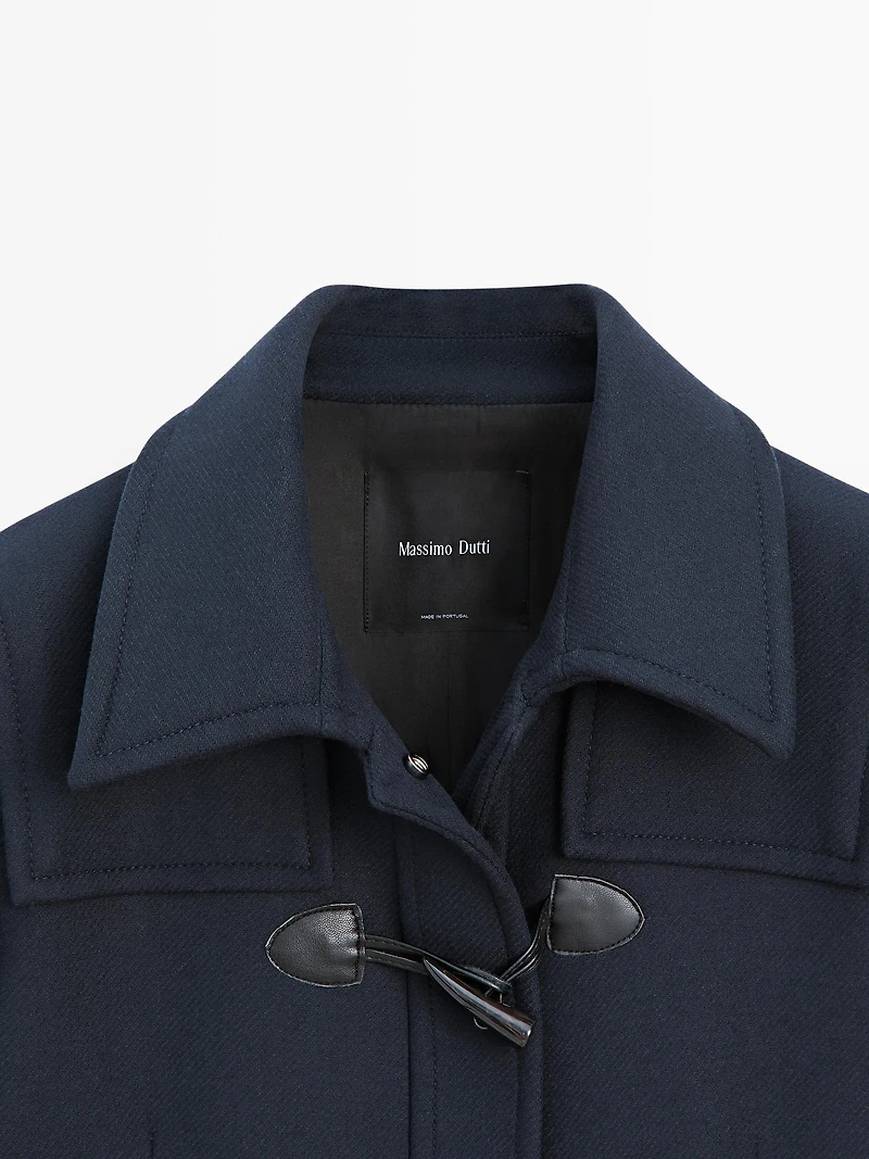 Long coat with toggles