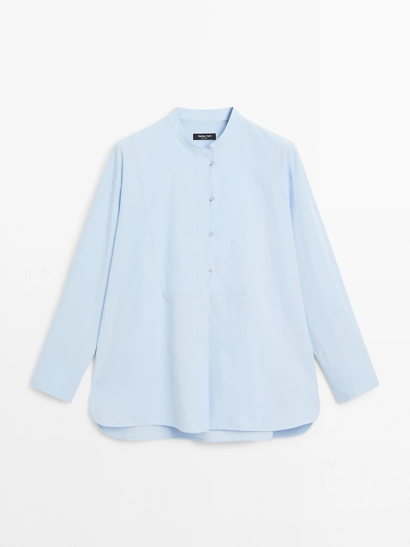 Shirt with stand collar and bib