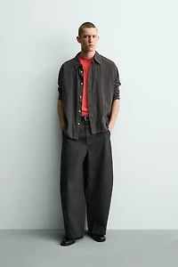 RELAXED FIT PANTS WITH TWISTED SEAM
